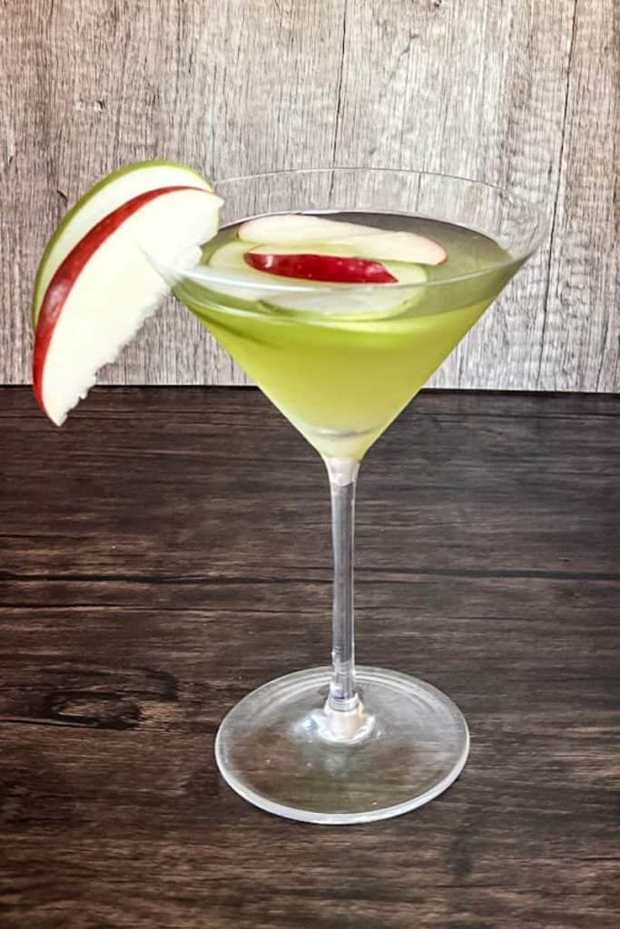 Appletini garnished with red & green apple slices