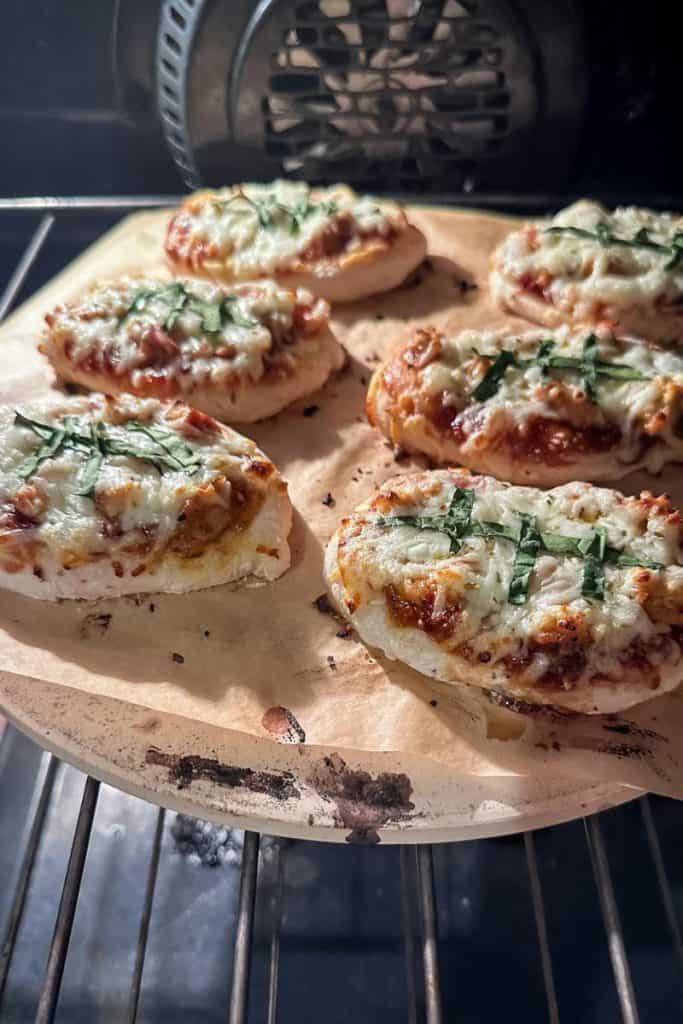 bbq chicken pizza in shape of football