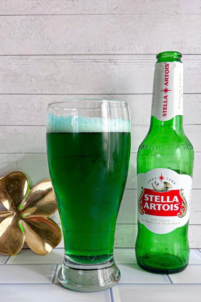 green Stella beer in a glass