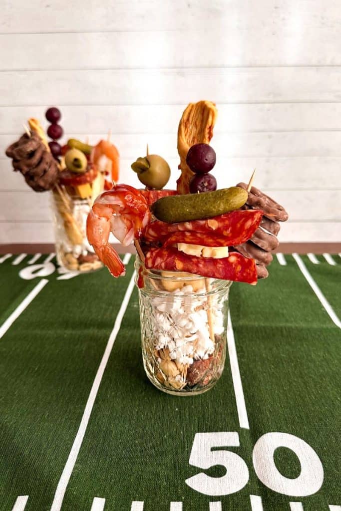 Jarcuterie mason jar filled with appetizers